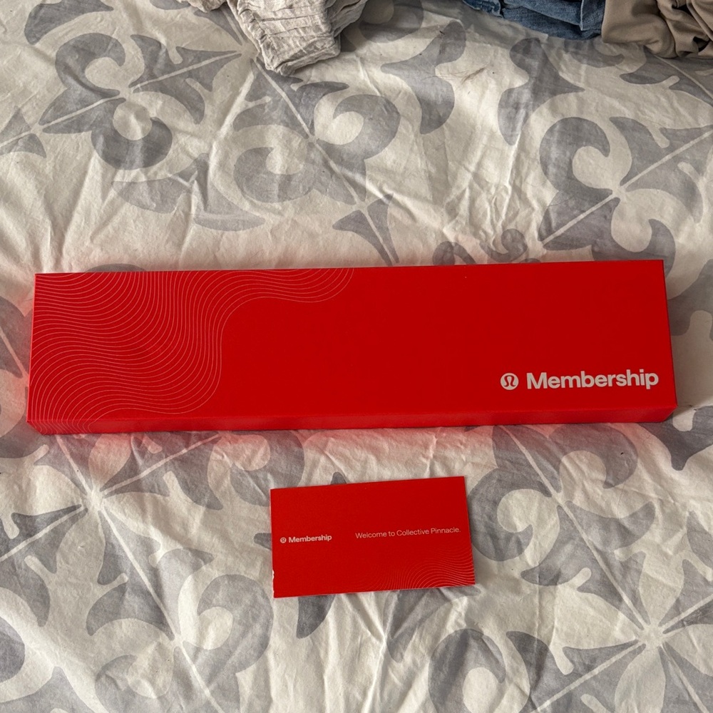 Lululemon Red Membership Never Lost Keychain